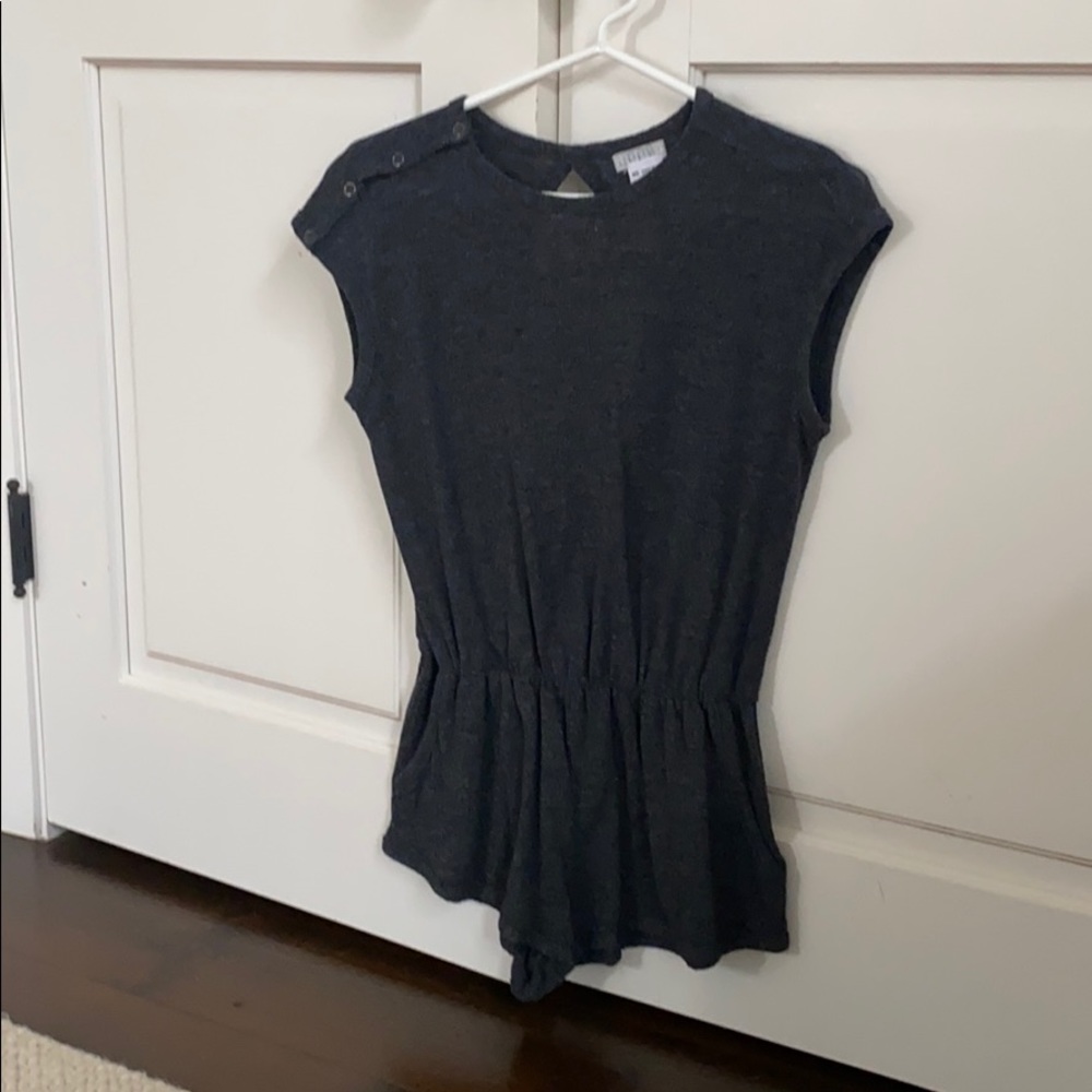Gray Romper with an open back and pockets